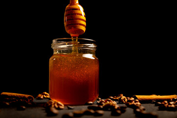jar of honey and spoon