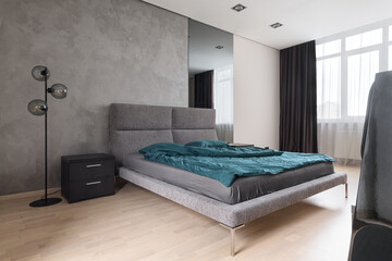 bedroom interior, stylish bed in a modern apartment