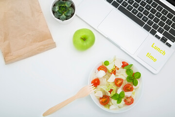 Business healthy lunch on workplace on white background flatly. Healthy lifestyle concept
