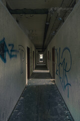 A dark empty corridor in an abandoned military building