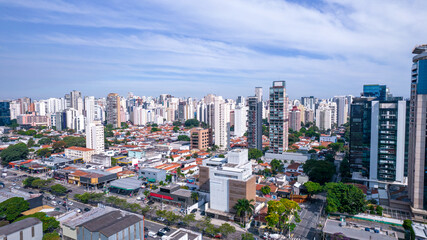 Fototapeta na wymiar Aerial view of Avenida Brigadeiro Faria Lima, Itaim Bibi. Iconic commercial buildings in the background. With mirrored glass
