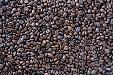Background of fresh roasted coffee beans, close up, top view