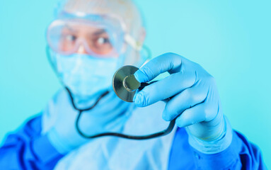 Doctor with stethoscope. Diagnostic instrument, medical equipment. Advertising hospital or clinic.