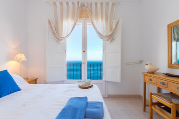 interior of a bedroom with sea views