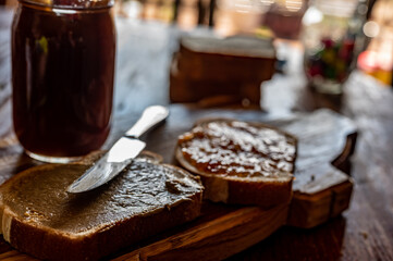 selective focus on butter knife edge used to spread a sunflower butter 