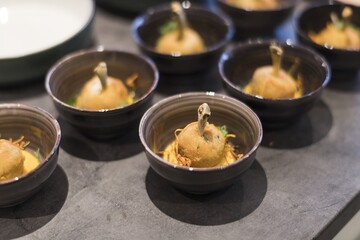 Preparing dinner. Food. Table, close-up, dining, background, lighting, people. Adventure restaurant.