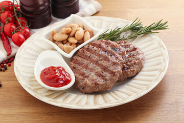 Grilled beef burger cutlet with sauce