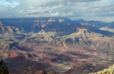 The Sun Casting Shadows and Light Over the Grand Canyon