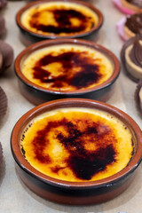 French bakery in morning, fresh baked sweet cream brule dessert on display