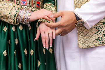 Fototapeta na wymiar Indian couple's holding hands close up