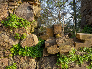 Obraz premium Ancient slabs from the temple. Restoration work. Part of an ancient masonry. Remains of history.
