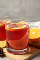 Aromatic punch drink and ingredients on table