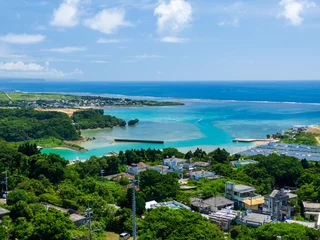 Foto op Canvas 晴れた日の沖縄県うるま市の観光スポットの宮城島の山から眺める風景 © tnehala