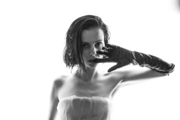 beautiful brunette woman white background, black and white photo