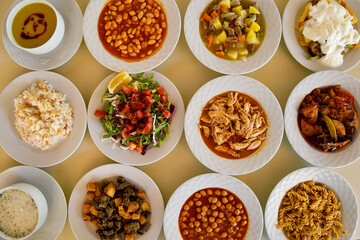 Table scene of assorted take out or delivery foods. Traditional Turkish cuisine. Various Turkish meal and appetizers. Top down view on a table.