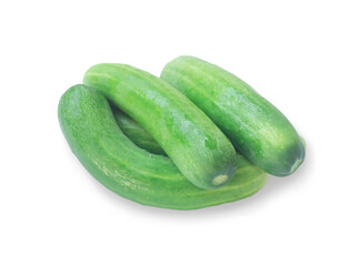 Fresh green cucumbers vegetable in pile, stack or heap isolated on white background with clipping path