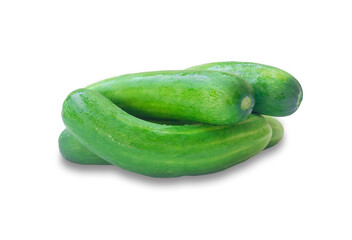 Fresh green cucumbers vegetable in pile, heap or stack isolated on white background with clipping path