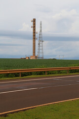 
power tower in the middle of the plantation