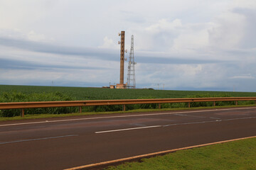 
power tower in the middle of the plantation