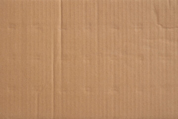 Fototapeta premium Old cardboard background with folds and creases.