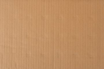 Old cardboard background with folds and creases.
