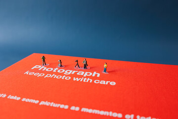 Photographers and photo album.