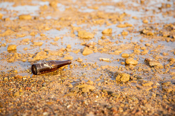 Bottled water washed away by seawater, marine debris.