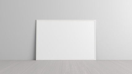 Mock up of horizontal white frame on the floor with white wall.