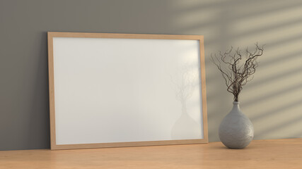 Horizontal wooden frame mock up on wooden shelf ot desk and gray wall