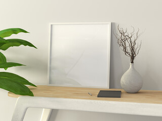 Square white frame mock up on wooden desk and white wall background.
