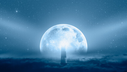 Night sky with super full moon in the clouds, on the foreground lighthouse 
