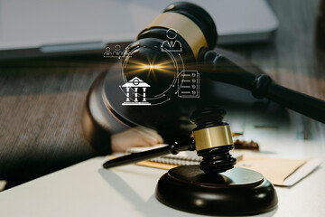 Judge gavel and legal book on wooden table, justice and law concept