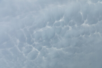 Cracked clouds in the sky from the transferred energy within.