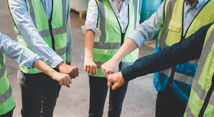 Manufacturing staff in safety hand together, unity collaboration cooperation or successful concept