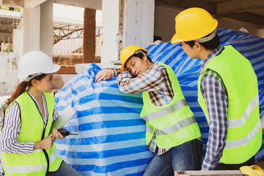 Female Foreman Charge Construction Site Looks Lazy Male Worker Taking Nap While Taking Advantage Colleague
Detrimental Effect Delayed Work Wasted Time Dissatisfied Abd Male Workers Who Work Hard.