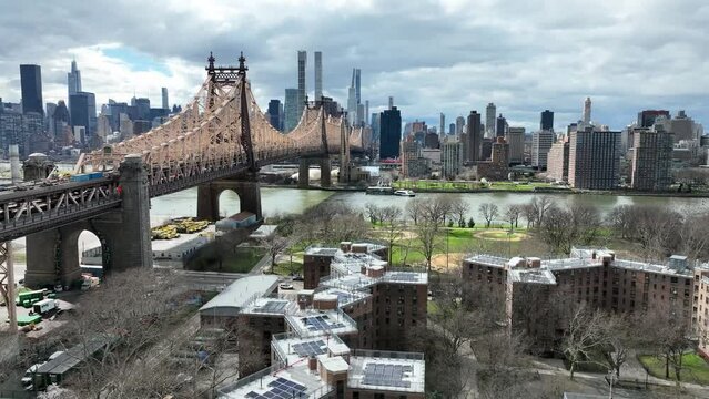 aerial over Queensbridge projects toward QUeensboro Bridge and Manhattan skyline New York City
