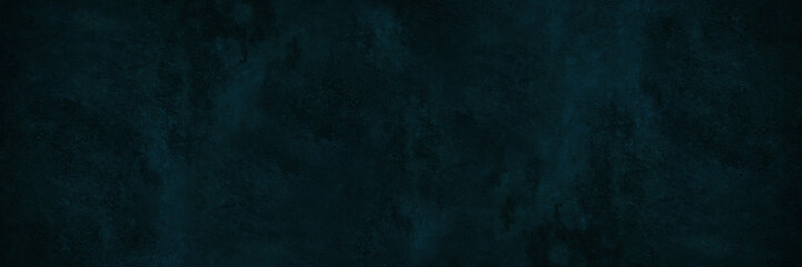 Black blue green abstract background. Toned rough concrete wall surface texture. Dark background with space for design. Grunge. Web banner. Wide. Panoramic.
