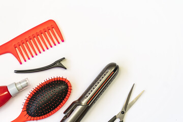 Hairdressing tools on a white background. Hair care concept.