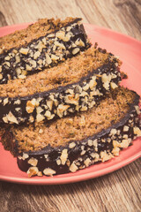 Pieces of zucchini dough with nuts and raisins. Delicious dessert. Vintage photo