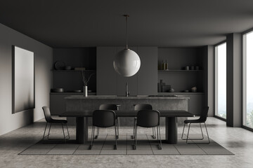 Grey kitchen interior with chairs and table, dining space and window