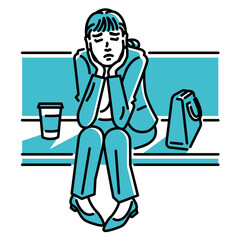 ベンチに座って、不安気な表情を浮かべるビジネスパーソン（女性）