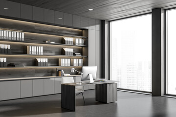 Office interior with table and computer, shelf with folders and panoramic window