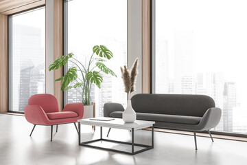 Lounge zone in business interior with coffee table and panoramic window