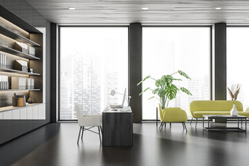 Office interior with work desk and chill zone, panoramic window
