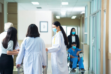  medical team pushing stretcher injured patient  Seriously  towards to Operating Room