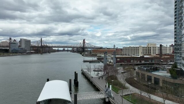 aerial toward Queensboro Bridge from Long Island City Astoria Ferry on water New York City NYC