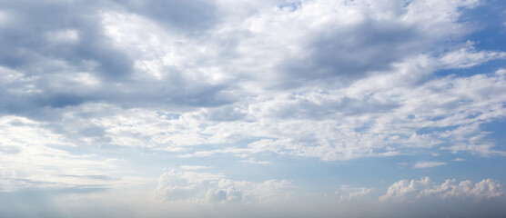 Obraz premium The dark sky with heavy clouds converging and a violent storm before the rain.Bad weather sky..