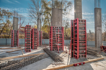 The reinforcement frame of the column lies on the concrete.