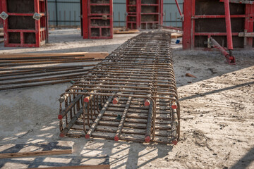 The reinforcement frame of the column lies on the concrete.