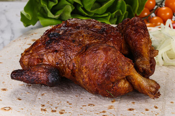 Grilled chicken with herbs and spices